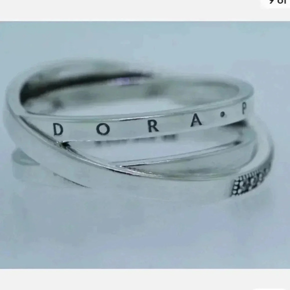 > Ring engraved with Pandora and has multiple cubic zirconia stones - Picture 1 of 9